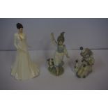 Two Lladro Figures, Modelled as a girl with dog and a clown with dog, in original boxes, also with a