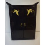 Japanese Black Lacquered Butsudan Cabinet, Having two doors, decorated with painted cranes, 51cm