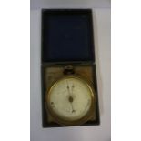 Travel Aneroid Barometer, circa 19th century, cased in brass, 12.5cm diameter, enclosed in a