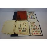 Four Stamp Albums, to include World and British stamps, circa 1950s, (a lot)