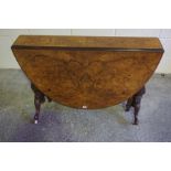 Victorian Burr Walnut Sutherland Table, Having drop leaves, raised on turned supports and scroll