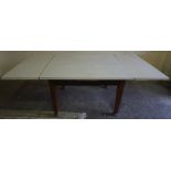 A Vintage Mahogany Pull Out Dining Table, Having a later laminate top, 76cm high, 121cm wide