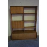 Retro Teak Lounge Display Unit by G-Plan, Having open shelving, flanked with two doors, above a