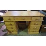 Pine Kneehole Desk, Having three assorted drawers, above two four drawer pedestals, 82cm high, 140cm