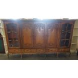 A Large Antique Style Bookcase by Schlingmann Wartmobel of Germany, Having three panelled doors,