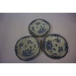 Fourteen Near Matching Chinese Blue and White Plates, (Qing Dynasty) Decorated with allover panels