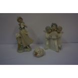 Two Porcelain Figure Groups by Lladro, Comprising of three winged cherubs with hymn book, and a girl