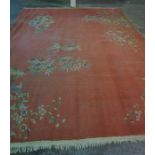 Large Chinese Style Carpet, Decorated with floral panels on a pink ground, 400cm x 306cmCondition