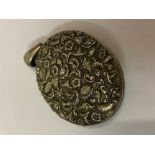 Indian Silver Locket, Having pierced decoration of flowers, also with two pierced bracelets, (3)