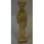 Chinese Ivory Desk Seal, Pre 1947, Modelled as a female, having an engraved mother of pearl seal