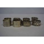 Four Silver Napkin Rings, one example Chinese, also with four silver plated napkin rings, (8)