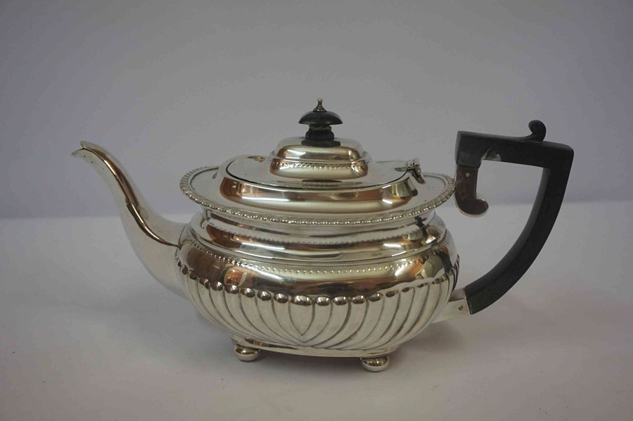 Silver Teapot, Hallmarks for Birmingham, Monogrammed, Having gadrooned decoration, raised on four