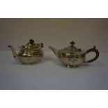 Two Silver Teapots, Hallmarks for Birmingham 1922 and 1926, one teapot is melon shaped, the other