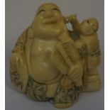 Japanese Ivory Netsuke, Pre 1947, Modelled as Hotei and Karako, Character marks to underside,