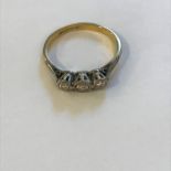 18ct Gold and Diamond Three Stone Ring, circa early 20th century, size O