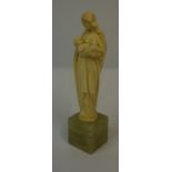Ivory Dieppe Type Carving, Pre 1947, Modelled as mother and child, raised on an onyx baseCondition