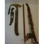 Two Eastern Style Daggers, with sheaths, also with a similar sword etc, (a lot)