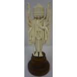 Indian Carved Ivory Figure, Pre 1947, Modelled as Ravana, raised on a wooden base