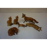 Three Beswick Fox Figures, also with three other ceramic figures of foxes, (6)