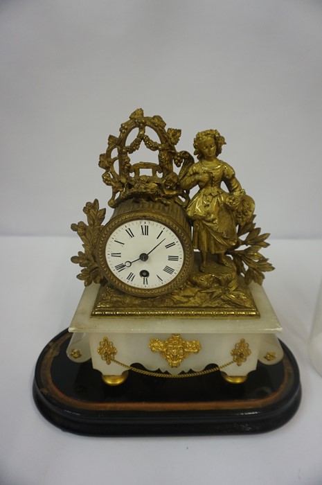 French Gilded Figural Mantel Clock, circa 19th century, Decorated with ormolu mounts, raised on an