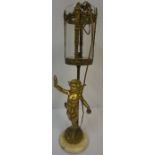 Gilded Table Lamp, Modelled as a Putti, raised on marble base