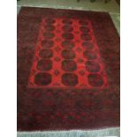 Persian Carpet, Decorated with multiple medallions on a red ground, 360cm x 262cm