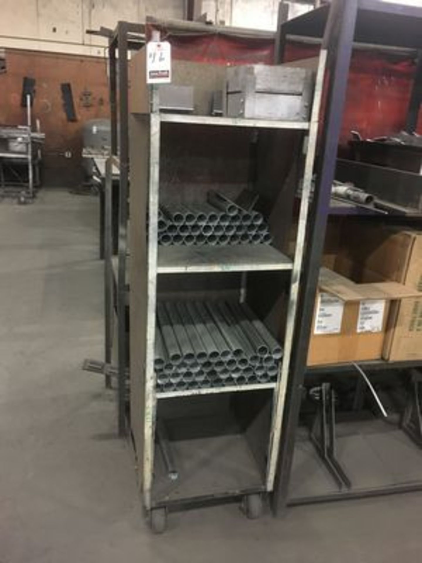 18"X5' PORT. METAL STORAGE RACK W/ METAL PIPE CONTENTS