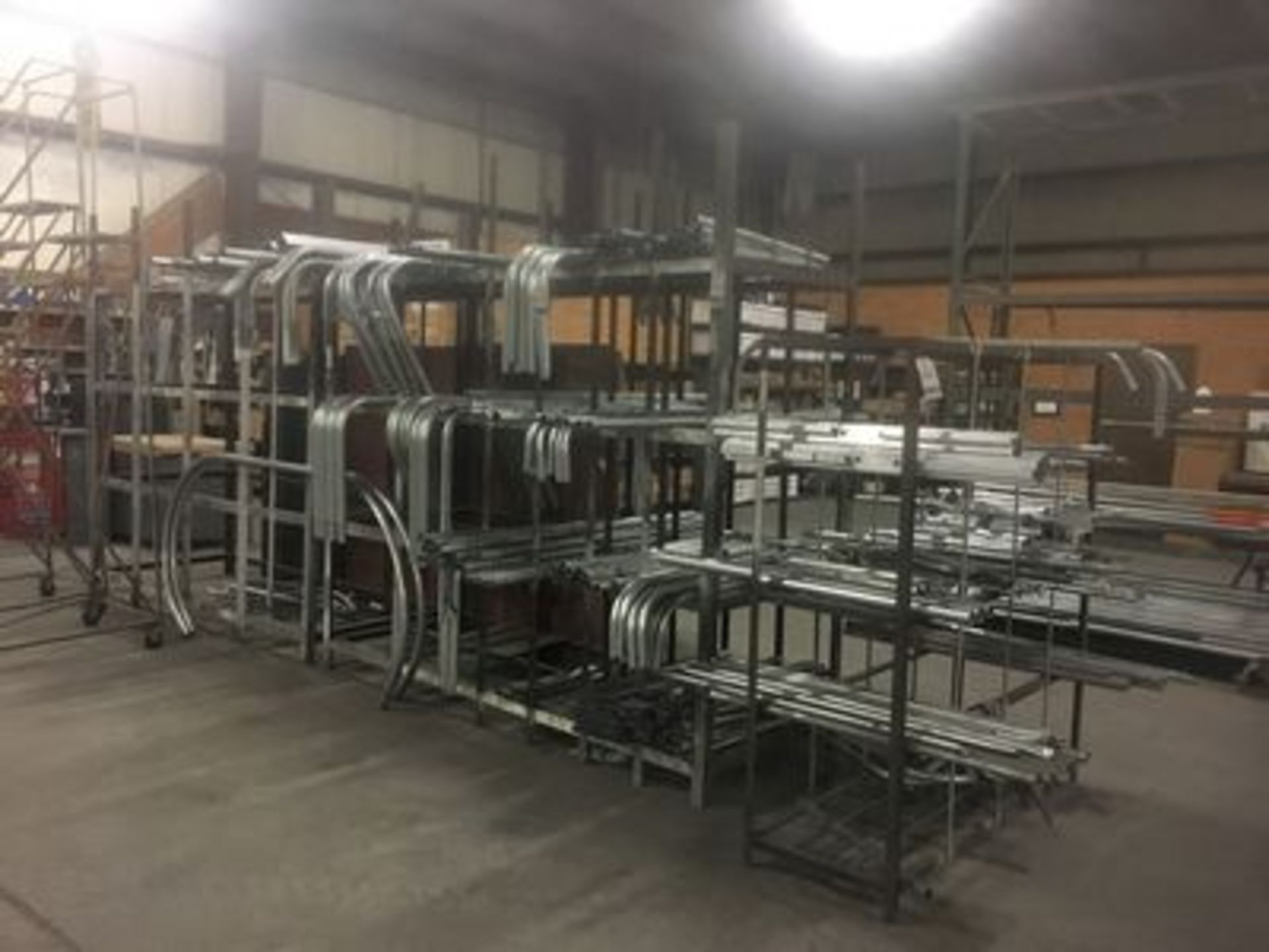 LOT OF ASS'T. CURVED METAL PIPING W/ METAL SHELVING