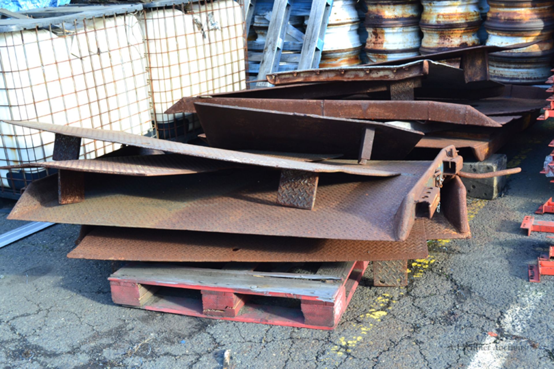 10- assorted steel dock plates (poor condition)