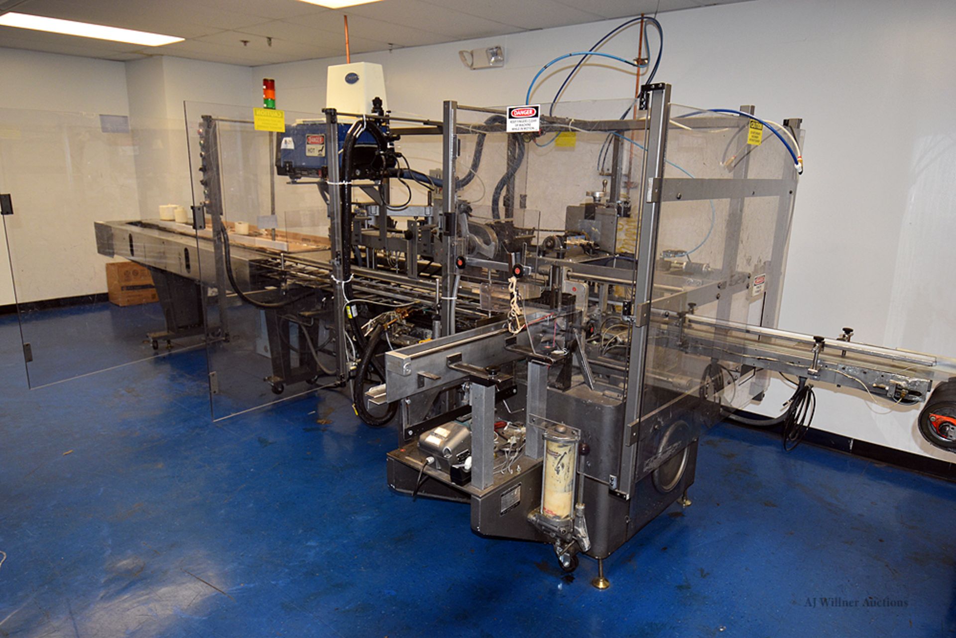 R.A. Jones Model CMV-5 Cartoning Machine w/ Nordson 2302 Hot Glue, Power Belt Takeway Conveyor