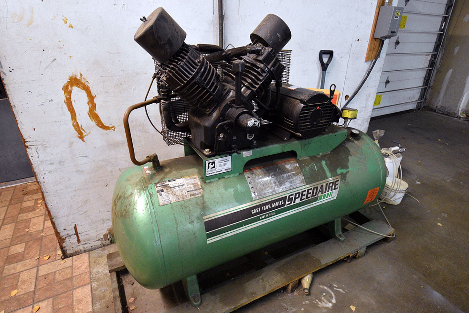 Speedaire model 5F233B cast iron series air compressor, s/n L12/5/97/00774, w/ 10 H.P. motor, w/ 120