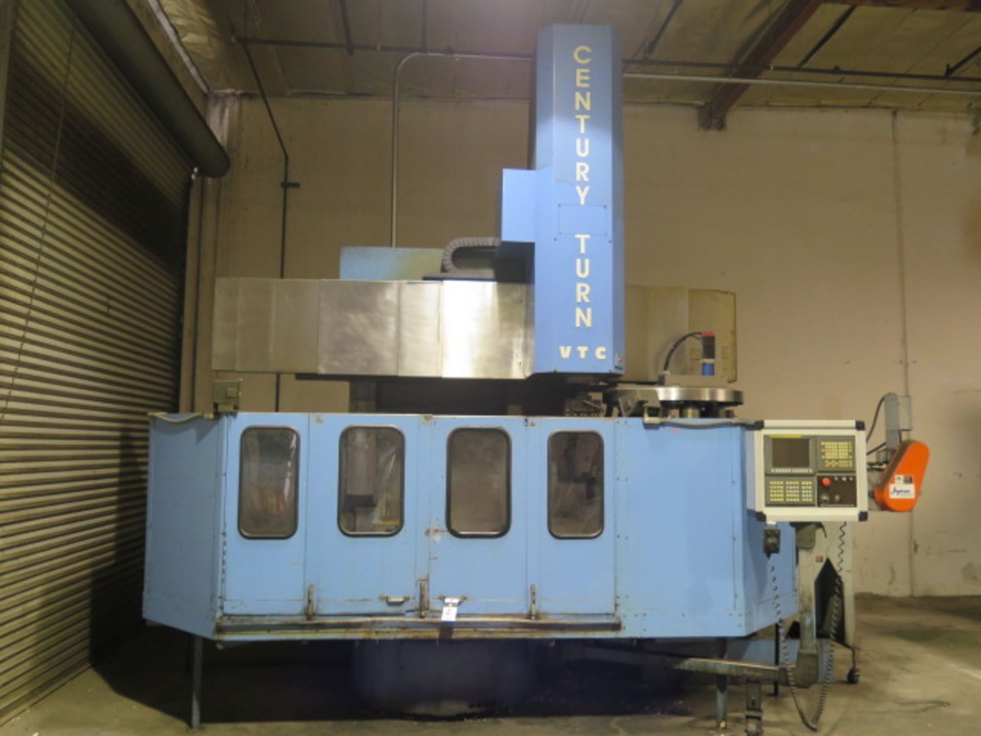 2011 New Century "Century Turn" 46" CNC Vertical Turning Center w/ Fanuc 0i-TD Controls, 12-ATC