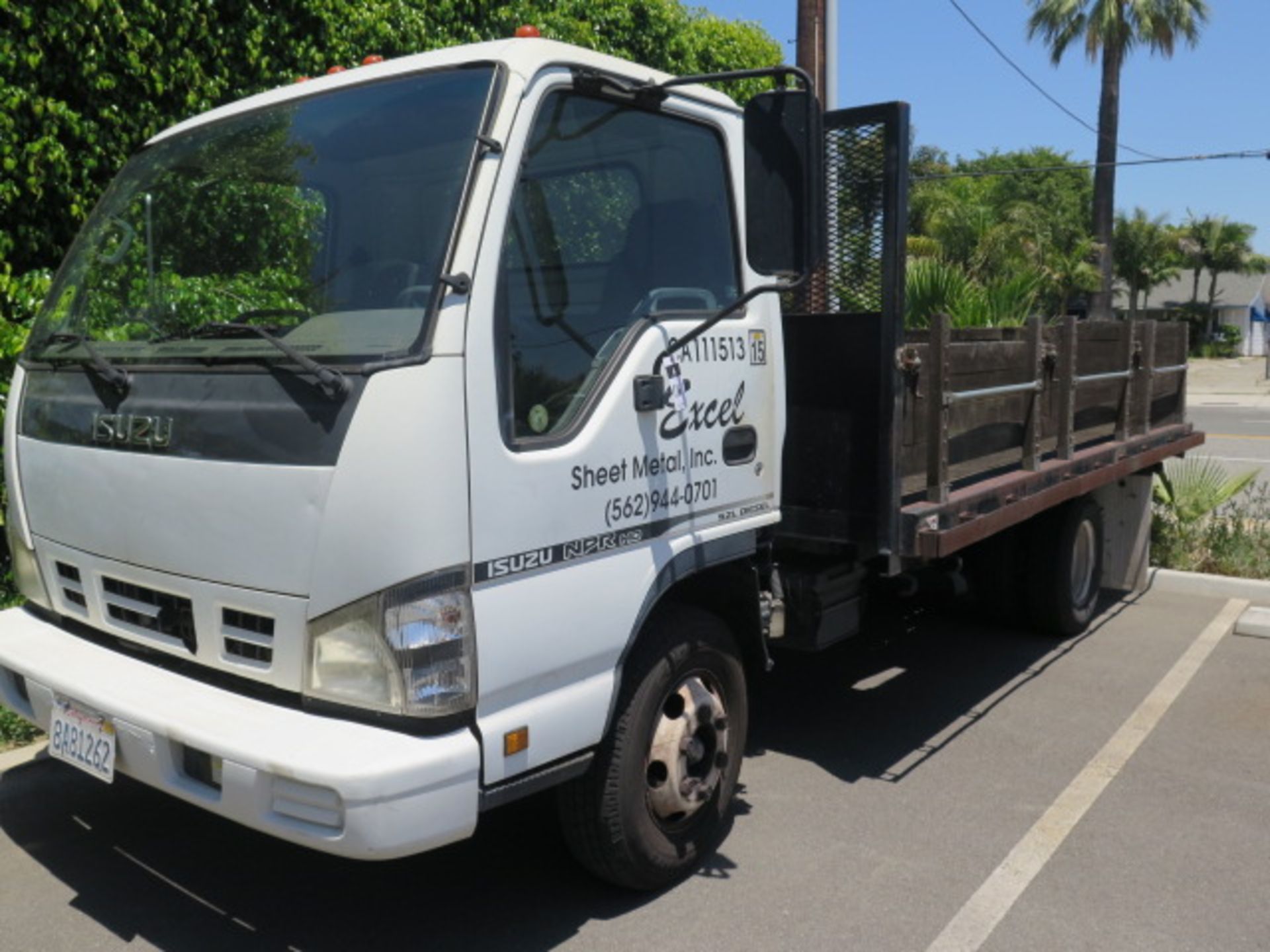 2006 Isuzu NPRHD 12’ Stake Bed Truck Lisc# 8A81262 w/ 5.2L Diesel Engine, Automatic Trans, AC, AM/ - Image 2 of 13