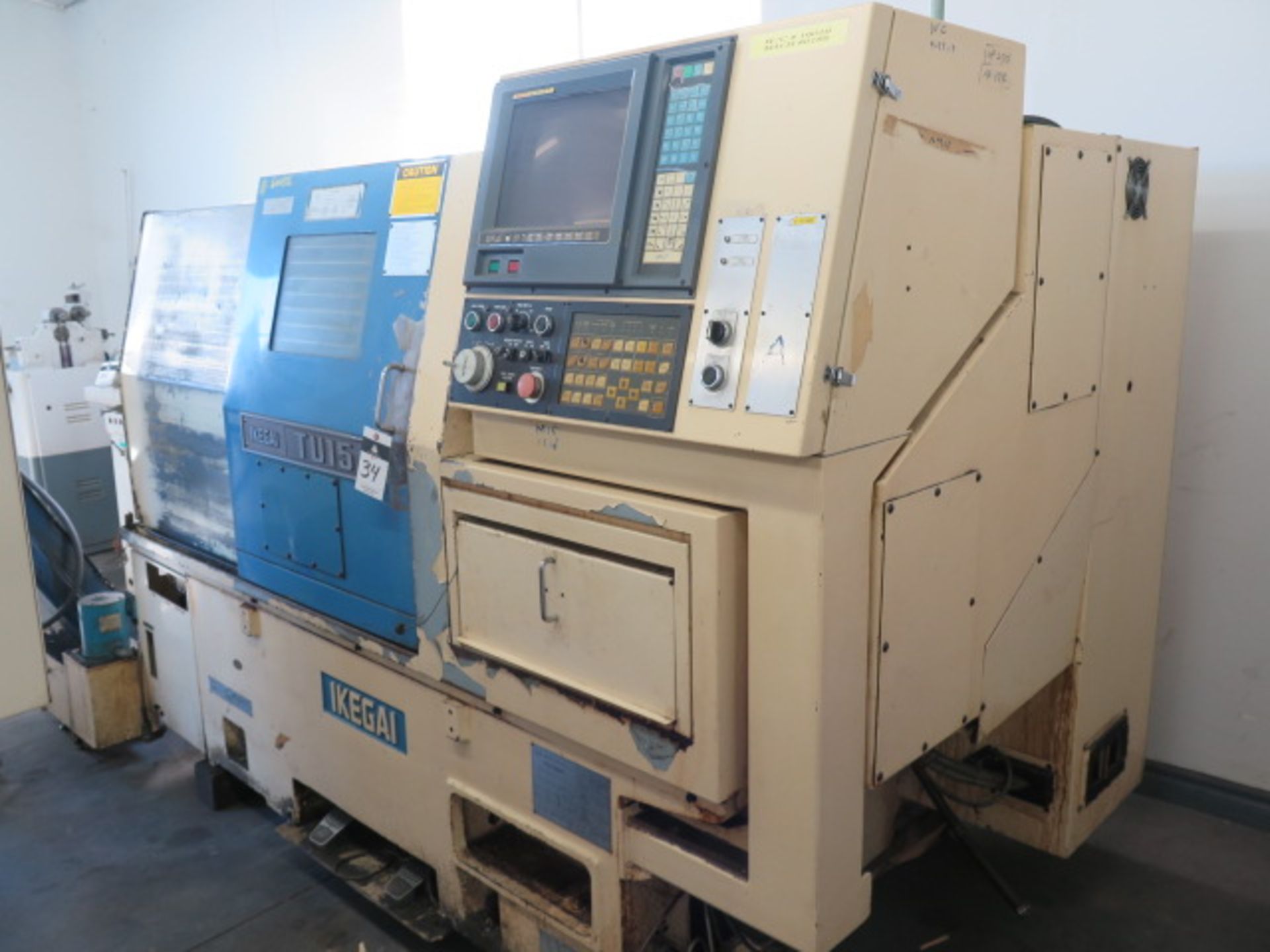 Ikegai TU15 CNC Turning Center s/n 51292V w/ Fanuc System 15-T Controls, Tool Presetter, 12-