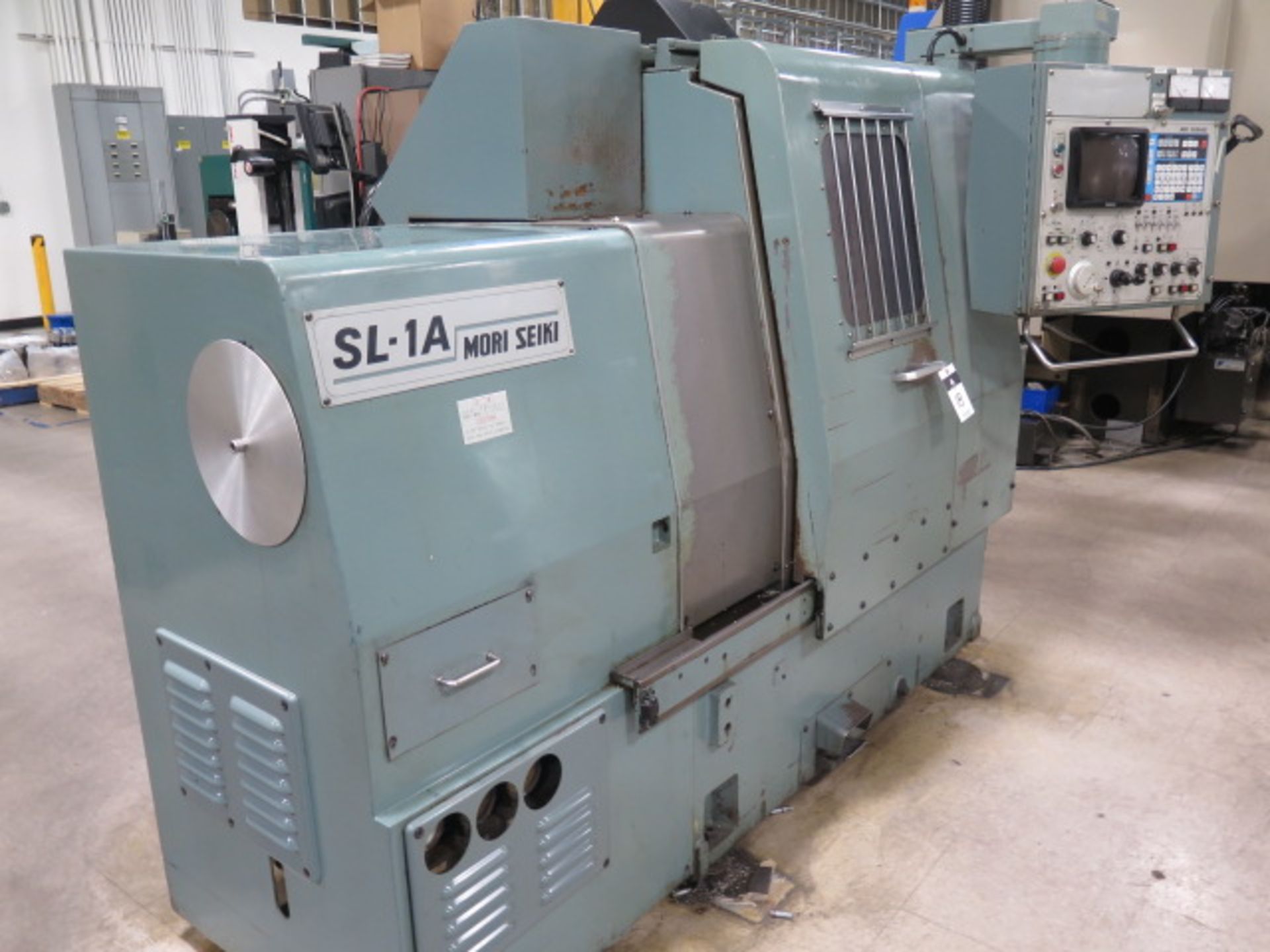 Mori Seiki SL-1A CNC Turning Center s/n 67 w/ Yasnac LX1 Controls, 12-Station Turret, Hydraulic Tail - Image 2 of 11