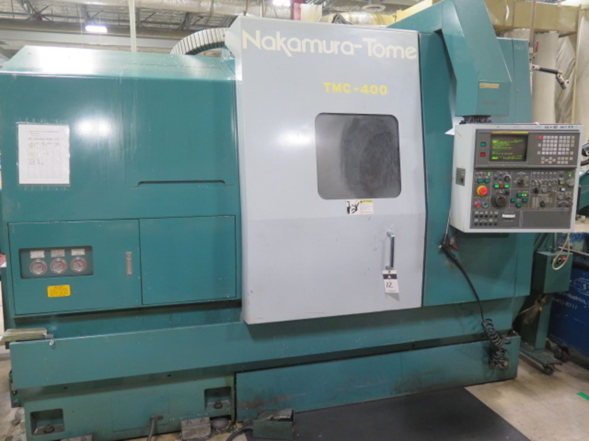 Nakamura-Tome TMC-400 CNC Turning Center s/n C401202 w/ Fanuc Series 16-T Controls, 12-Station Turre