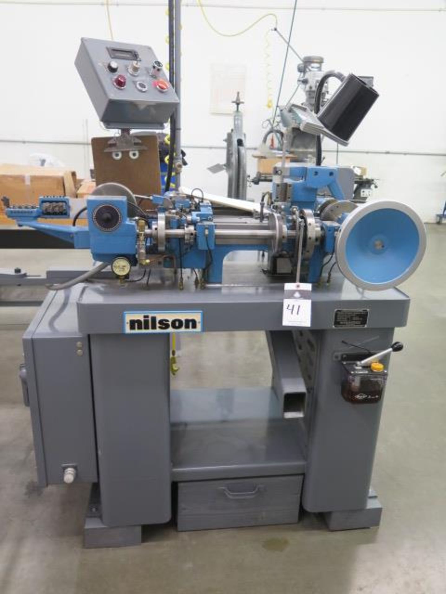 Nilson mdl. 700/L 1/32" Cap 4-Slide Machine s/n 110955 w/ Cutoff Head, 1-Ton Press Head, Misc Access