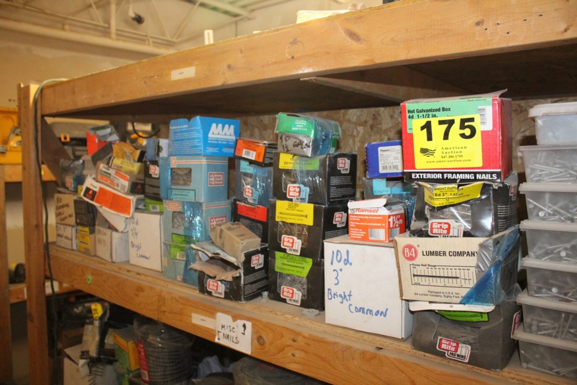 LARGE QUANTITY OF NAILS AND FASTENERS ON SHELF