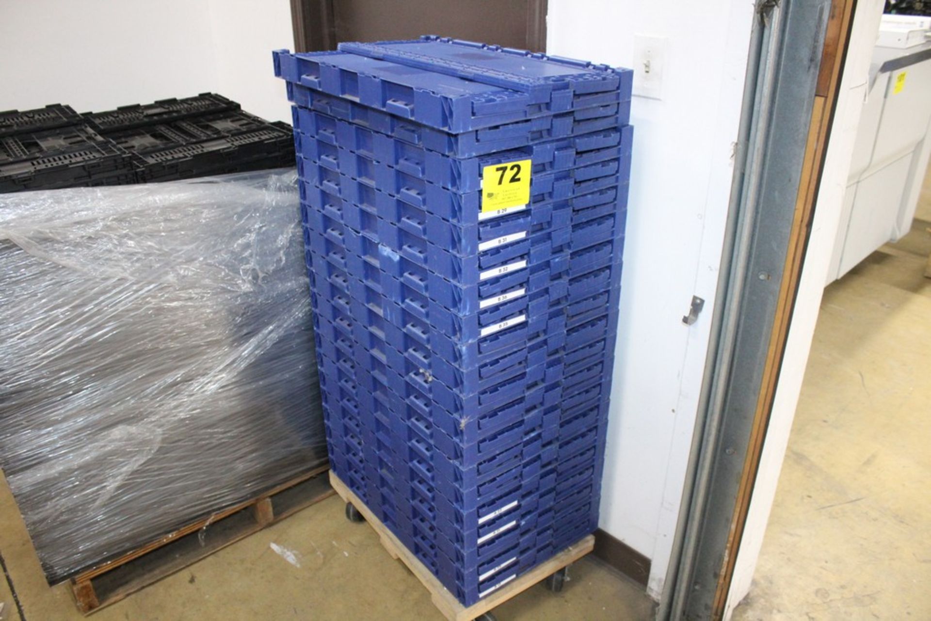 LARGE QUANTITY OF COLLAPSIBLE CRATES ON DOLLY