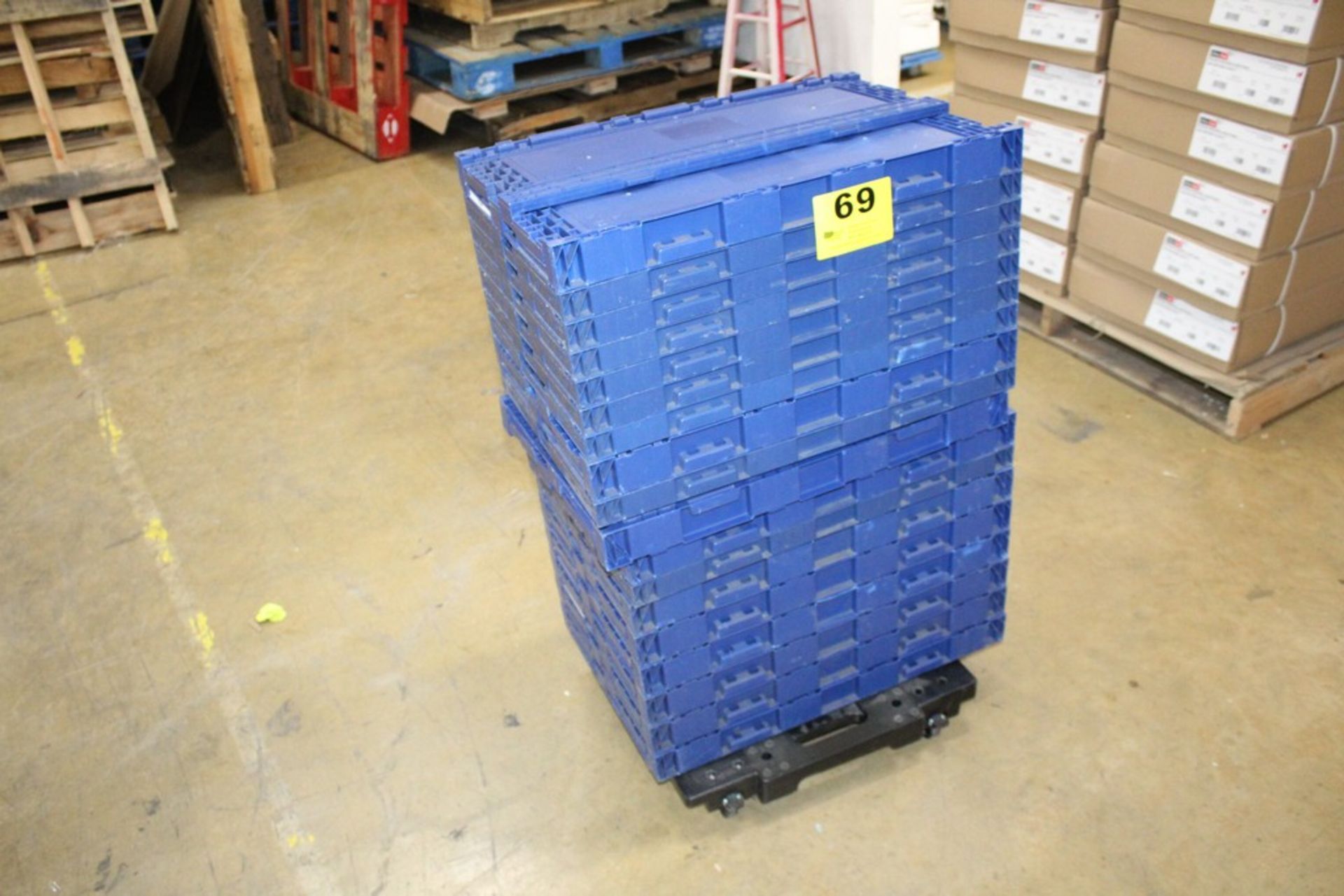 LARGE QUANTITY OF COLLAPSIBLE CRATES ON DOLLY