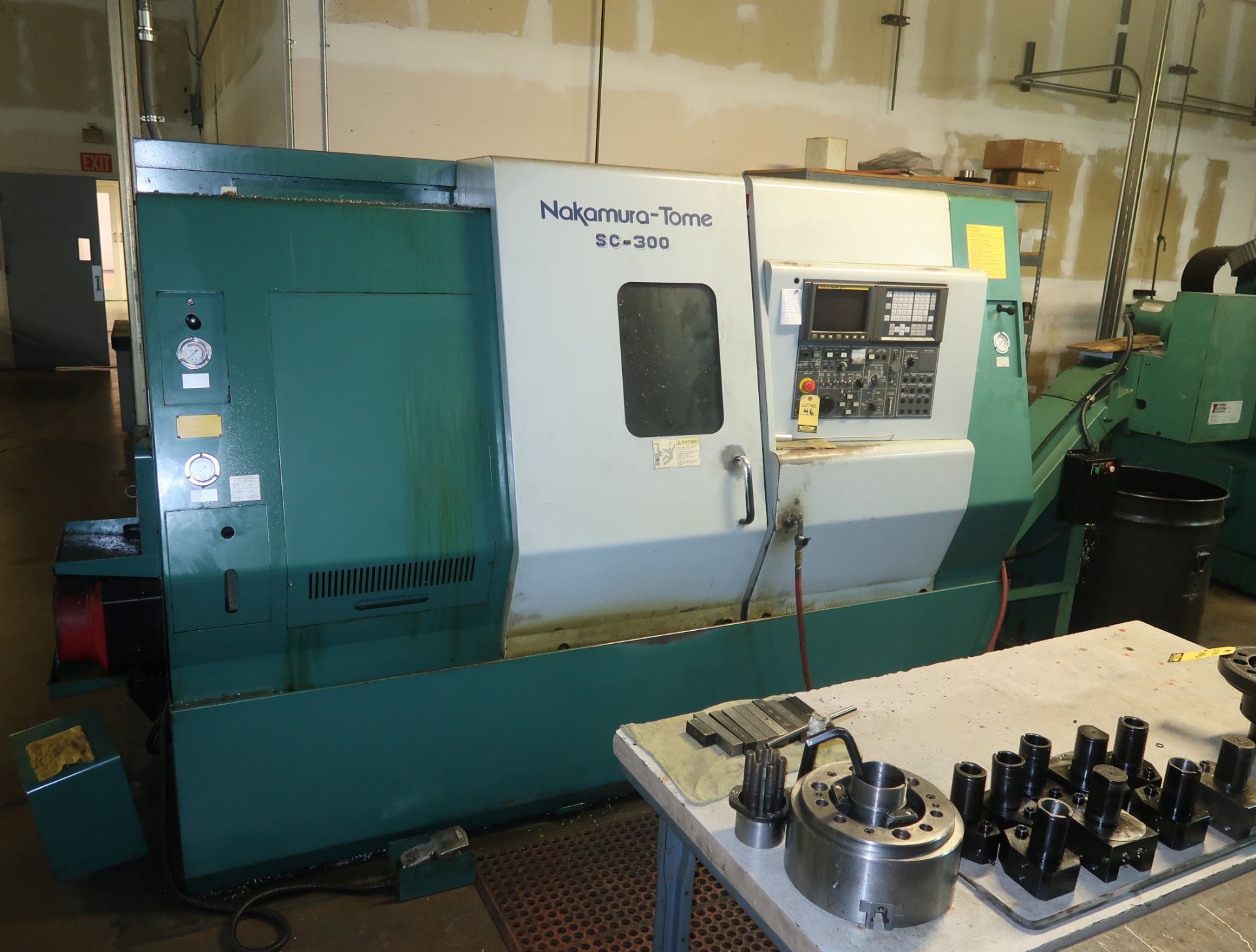 NAKAMURA-TOME SC300 CNC LATHE, FANUC 21-T CONTROL, TURBO CHIP CONVEYOR, SN. S308603, W/TOOLING ON