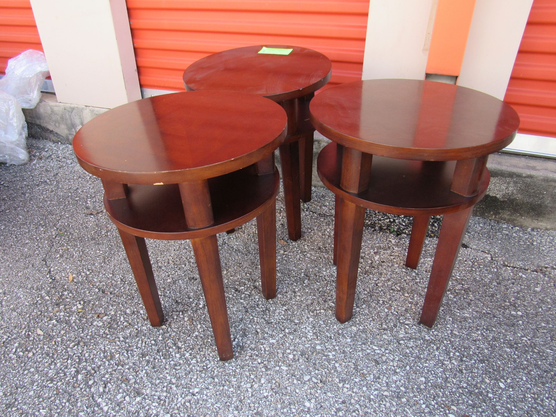 Three 18" round three-pedestal side tables