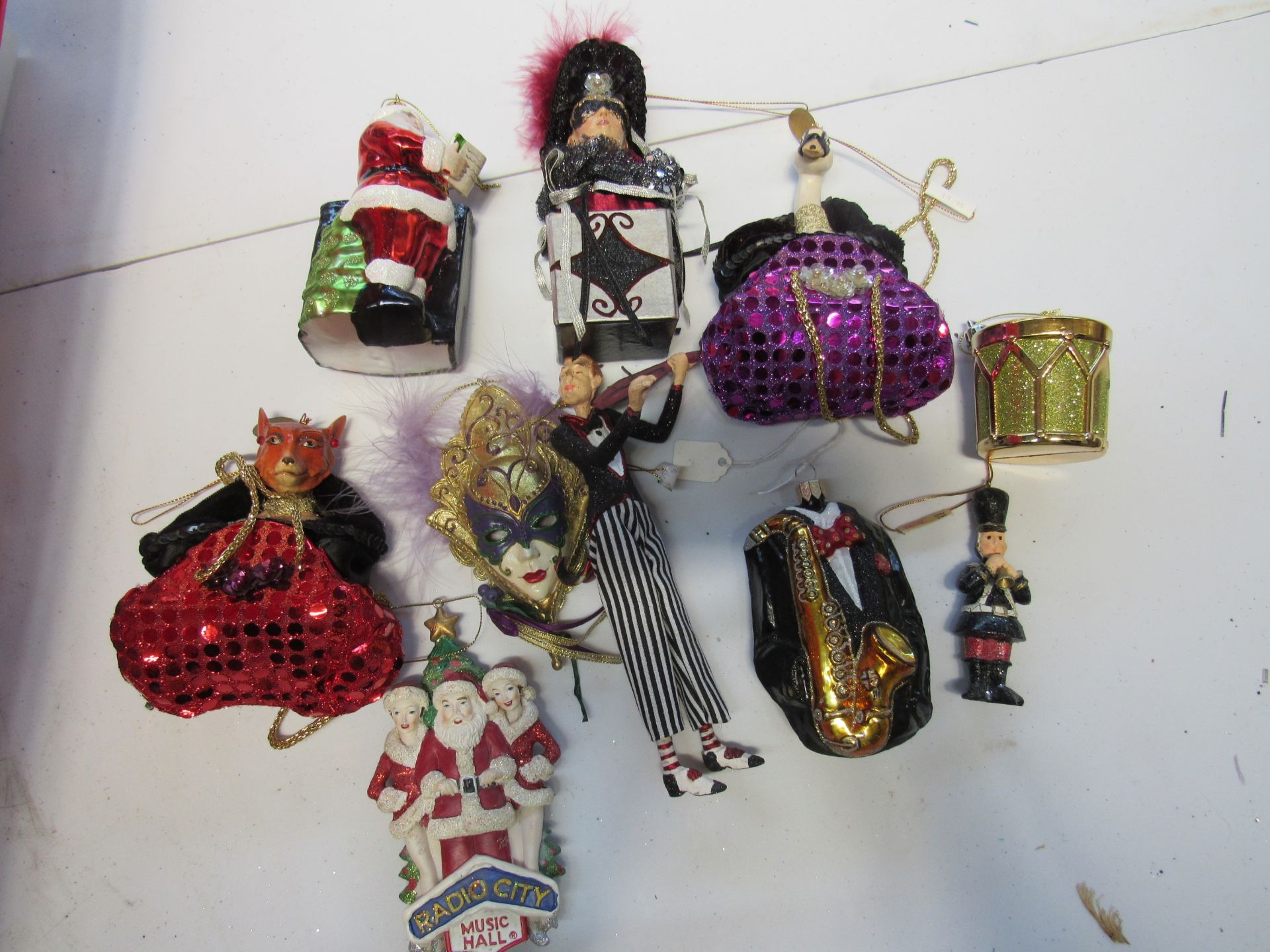 Group of jazz and Mardi Gras themed Christmas ornaments