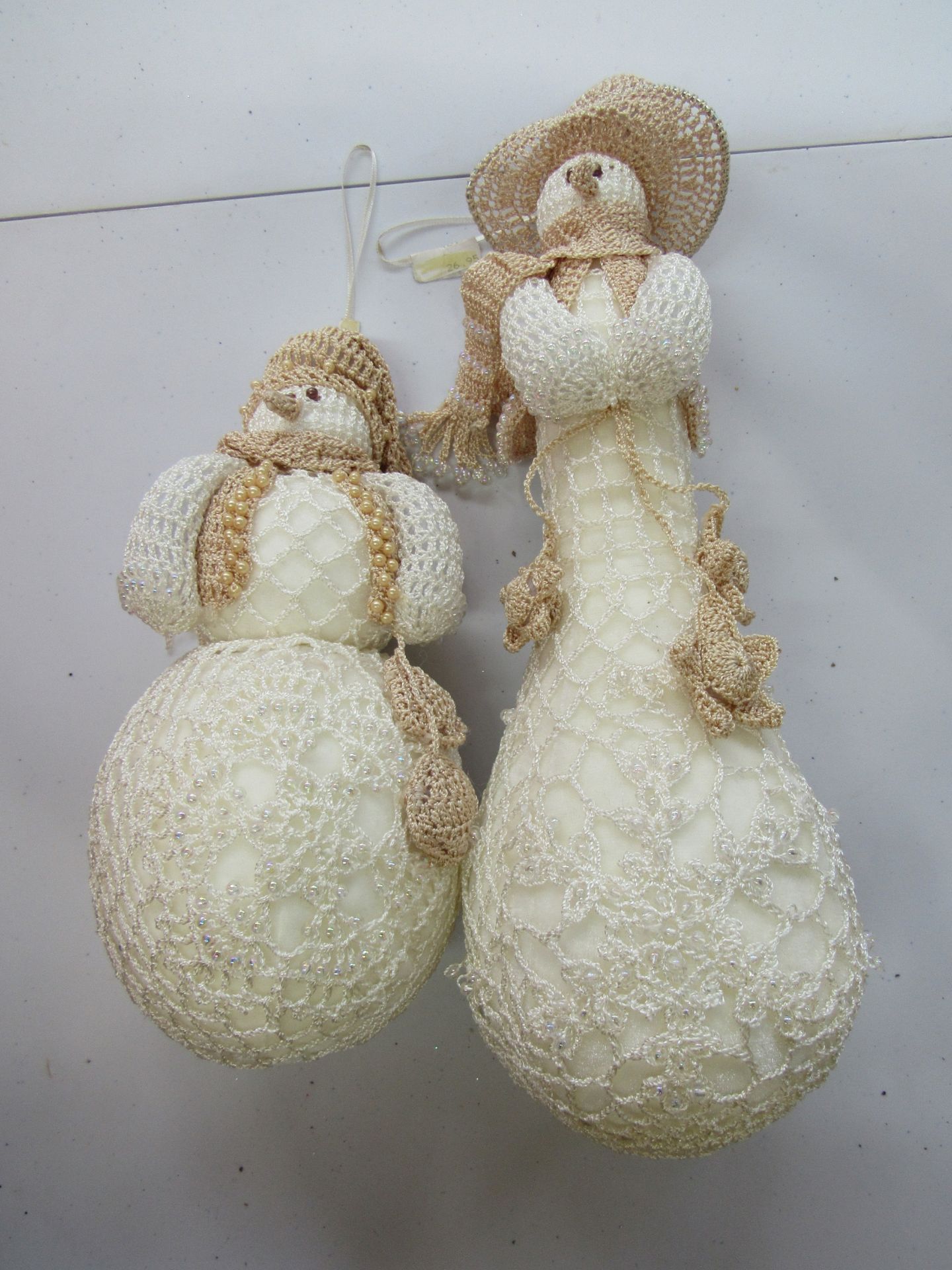 Hand crocheted snowmen
