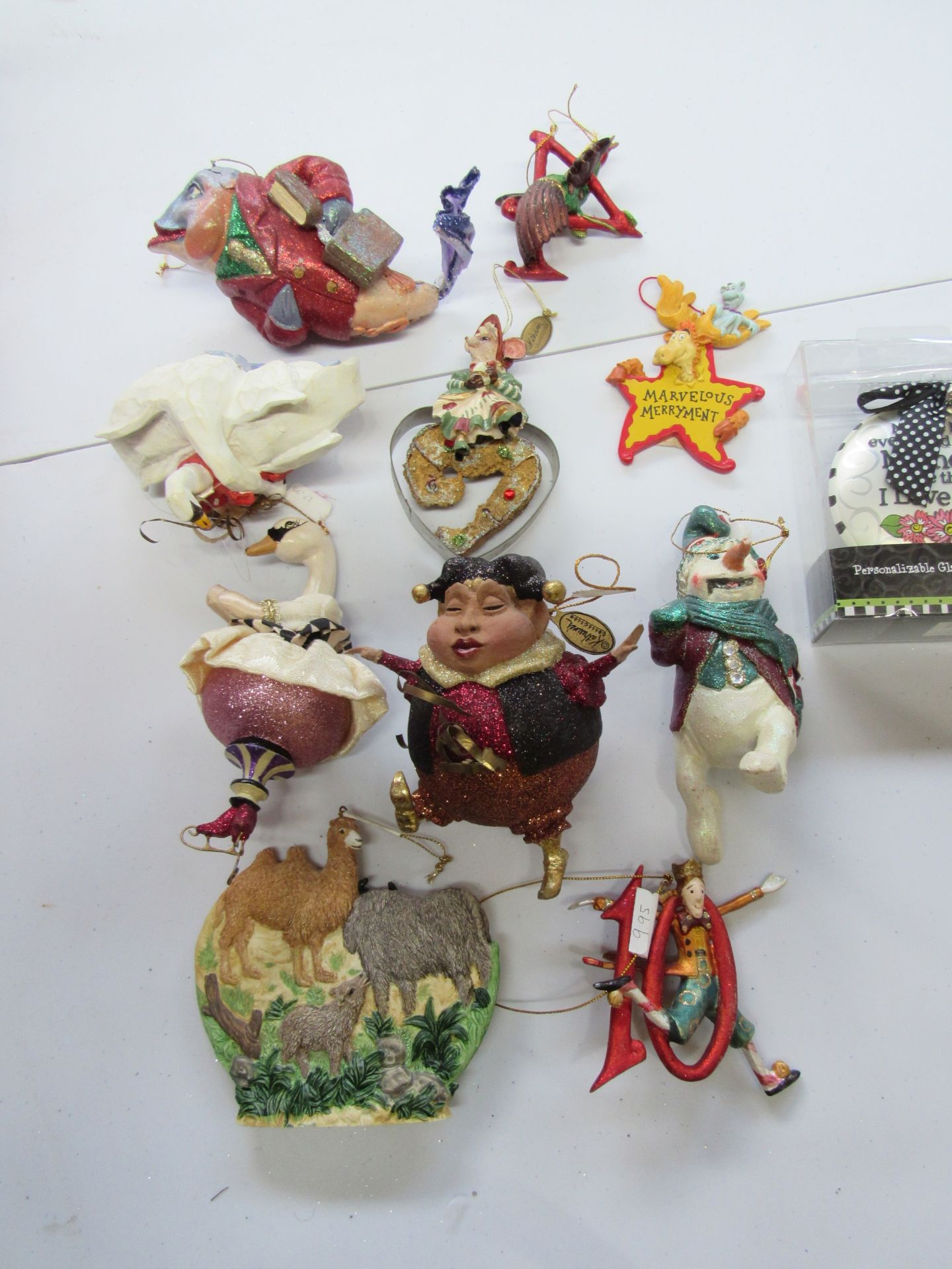 Group of Christmas ornaments: snowmen, swans, fish, Dr. Seuss, etc.