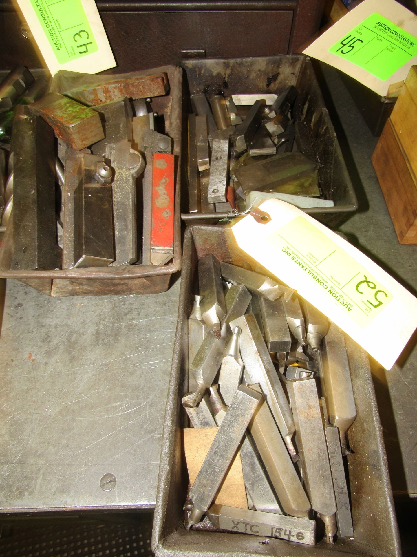 Three boxes of cutting heads and tool holders