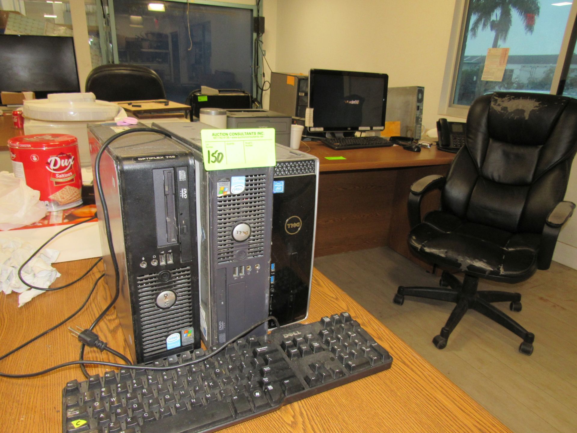 Five Dell computers, one monitor, two keyboards, one mouse, and a Brother printer