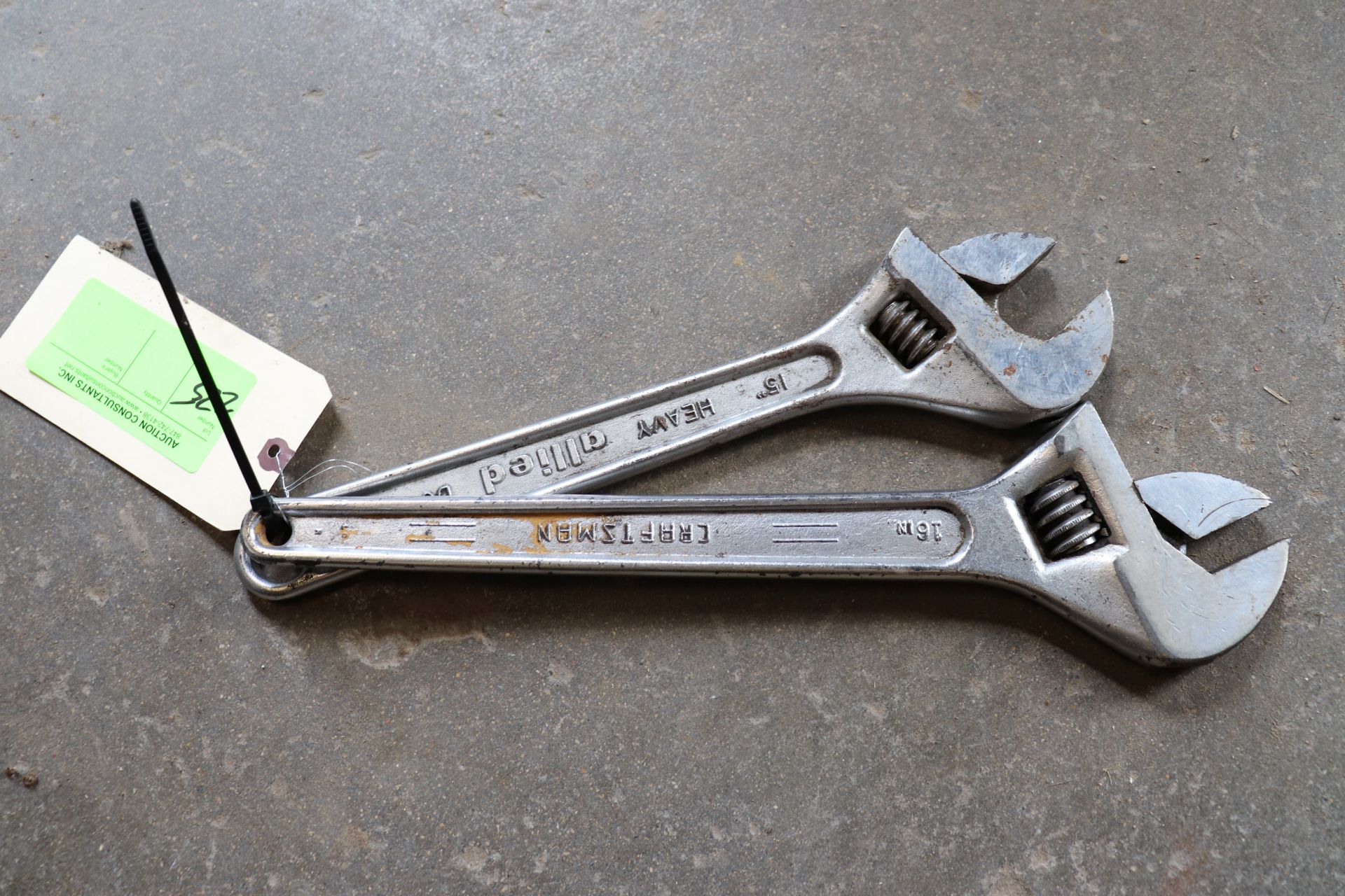 Two Craftsman wrenches, one a Craftsman 16" and one Allied 15"