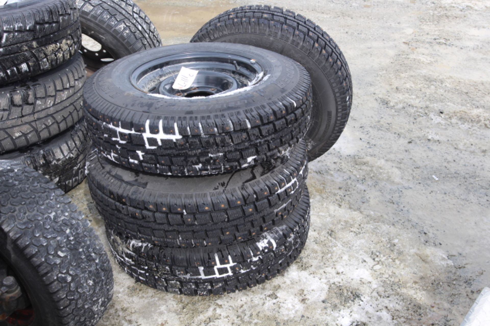 4 STUDDED TIRES W/RIMS OFF TOYOTA TACOMA BUT WILL FIT CHEV (ONLY DRIVEN 500 KMS) 215/85R18 - Image 2 of 3