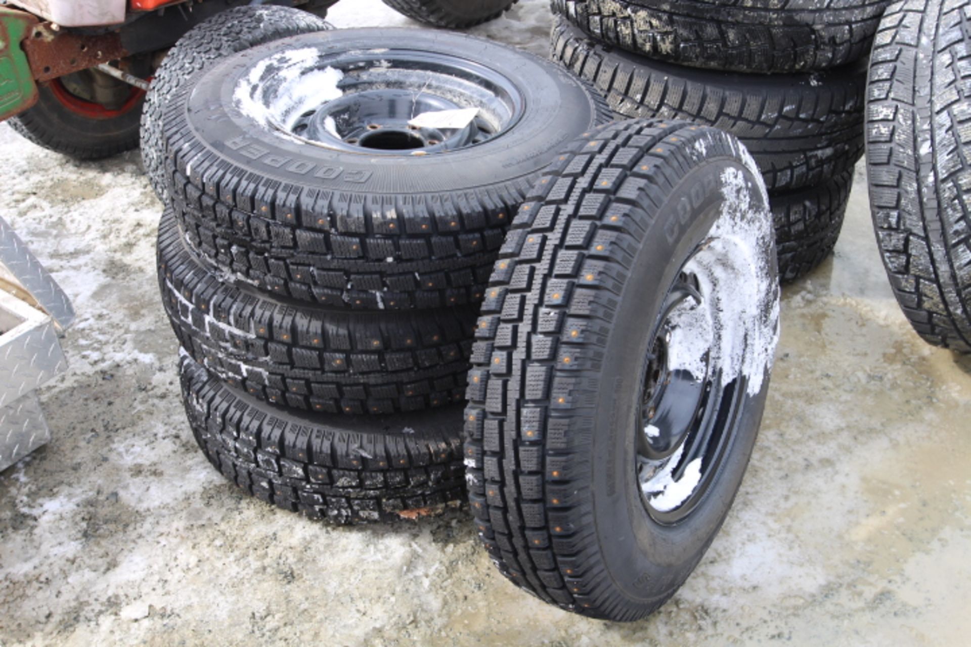 4 STUDDED TIRES W/RIMS OFF TOYOTA TACOMA BUT WILL FIT CHEV (ONLY DRIVEN 500 KMS) 215/85R18